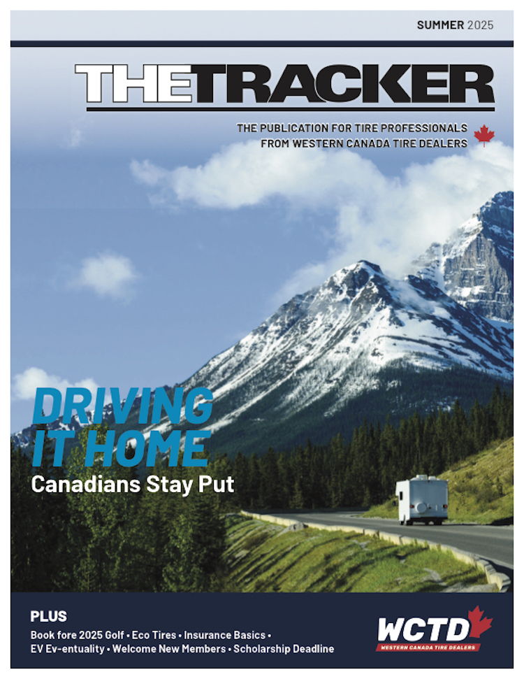 Summer Tracker cover showing mountains, road and camper